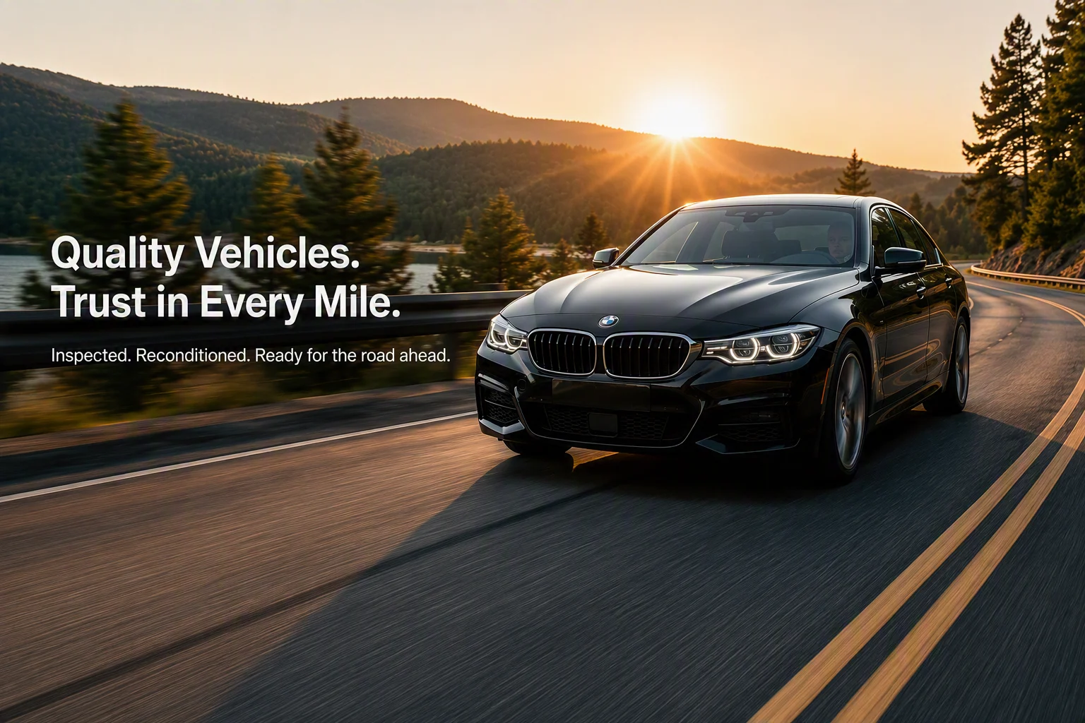 A black BMW sedan on a mountain highway at sunset, with the line Quality Vehicles. Trust in Every Mile. Inspected. Reconditioned. Ready for the road ahead.